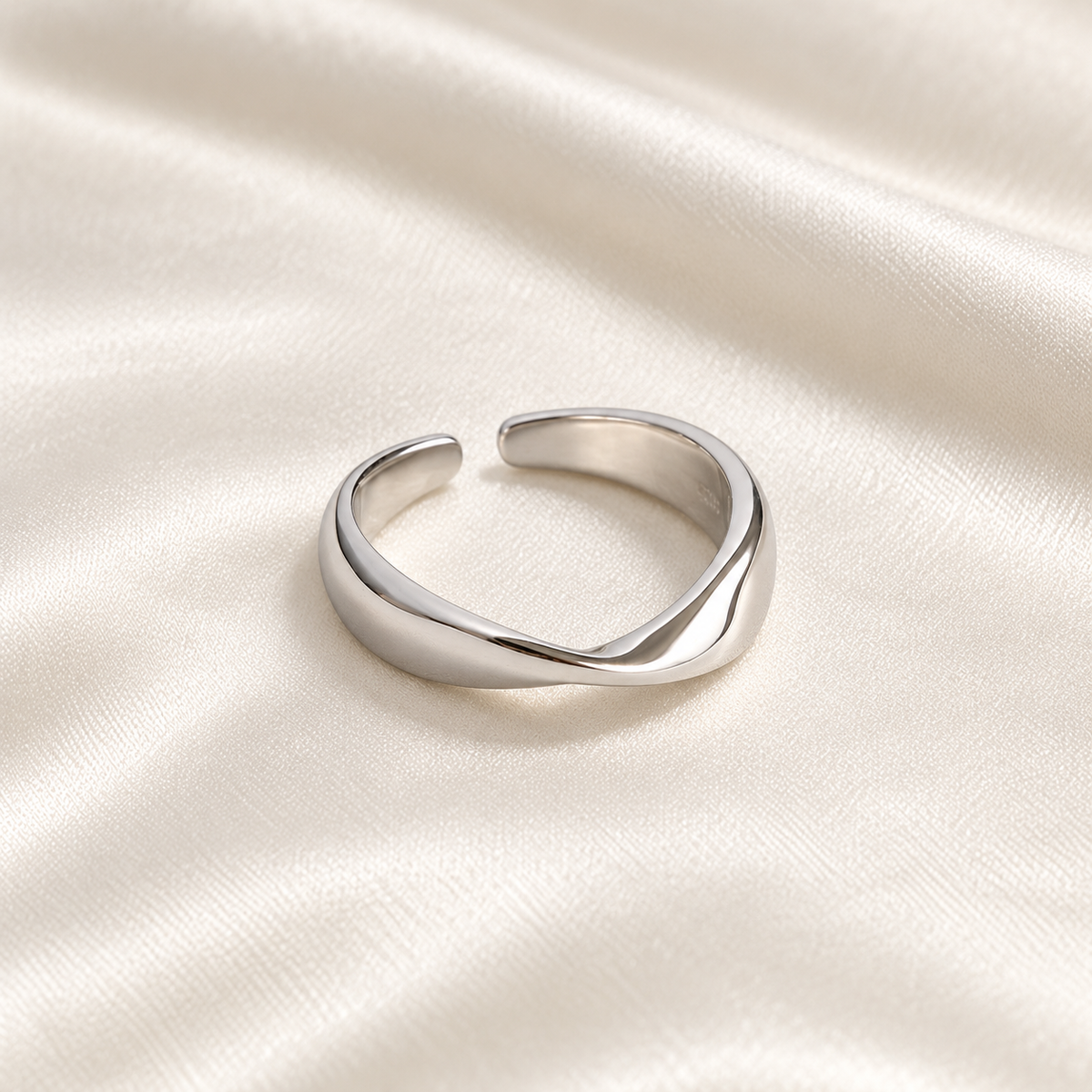 sculpt silver ring on ivory silk, view 1; digital product visualisation