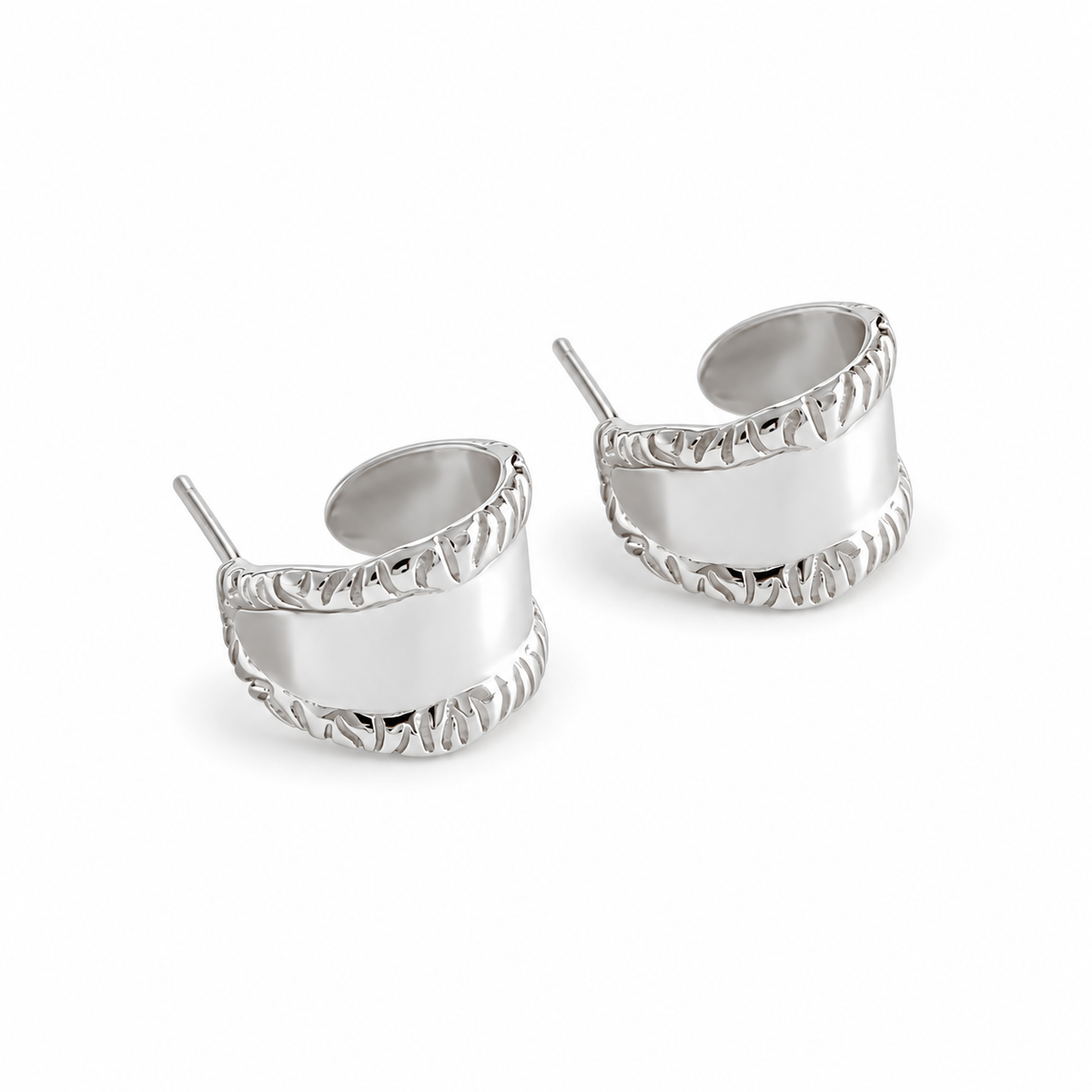 Digital studio visualisation of Silver carved wide stud earrings on white