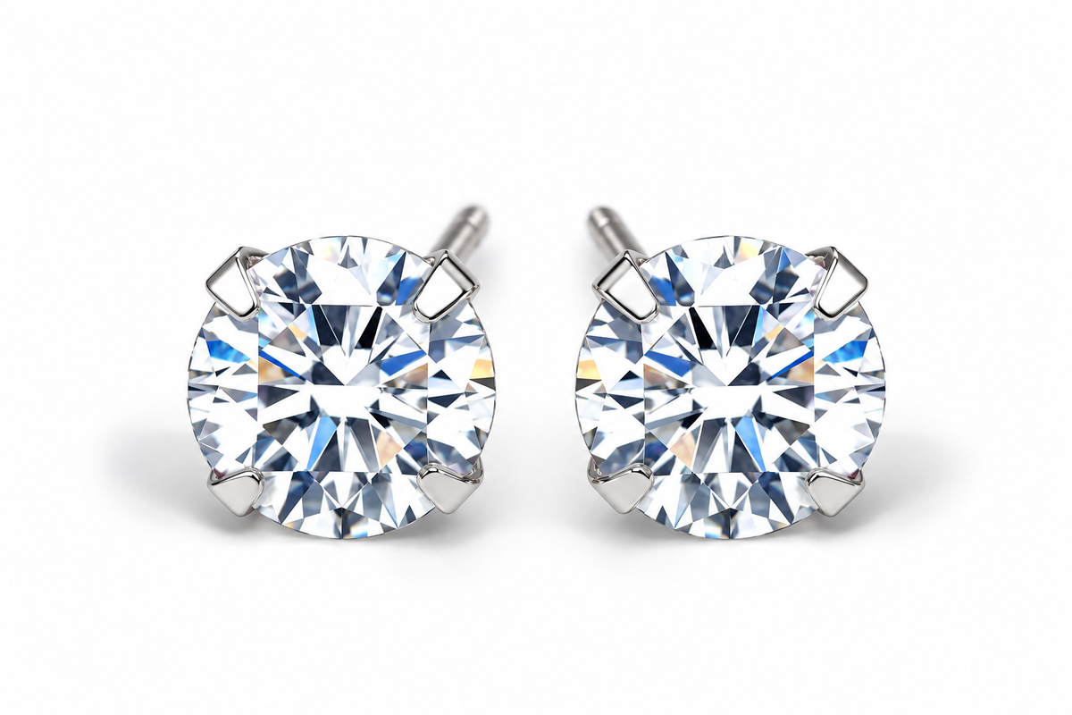 Clear round CZ stud earrings on white studio background